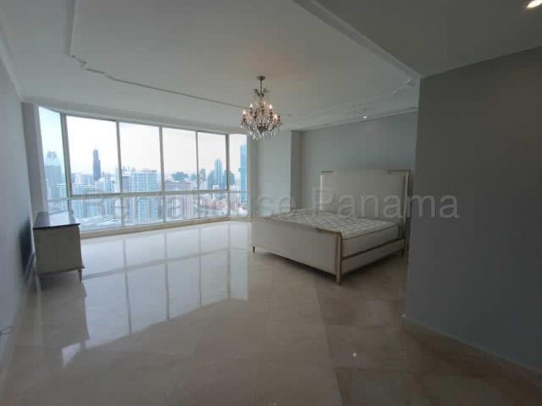 Bedroom with large windows, ocean views and walk-in closet PH Punta Roca Panama