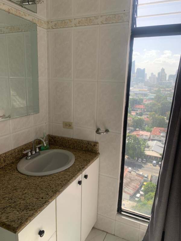 Kitchen with granite countertops, cabinets, stove, and fridge at Country Park San Francisco for rent