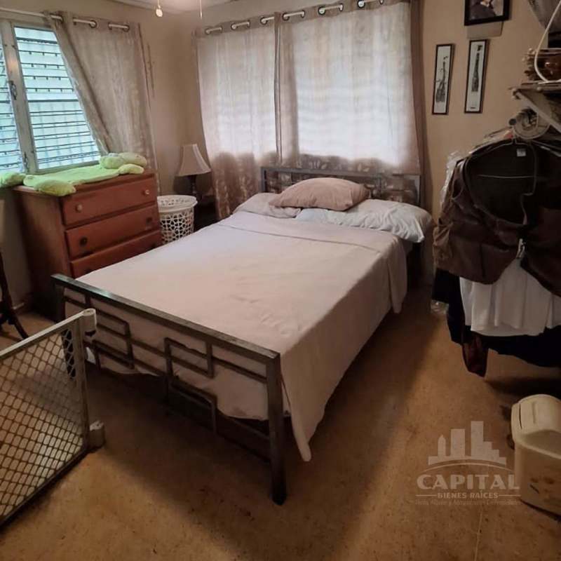 Spacious master bedroom with large windows ceiling fan corner home Betania La Gloria Panama