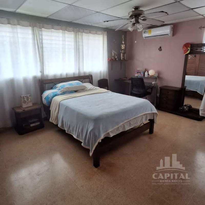 Bedroom large bright window ceiling fan corner house Betania Panama City sale