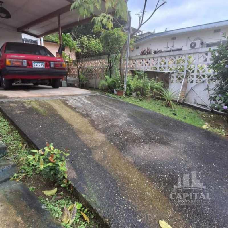 Covered carport gated parking with garden corner lot Betania La Gloria Panama
