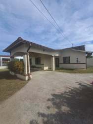 Kitchen with granite countertops and dark wood cabinets in La Fontana David