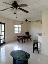 Spacious living and dining room with tile floor, ceiling fans La Fontana David