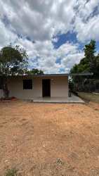 Kitchen area with new gas stove refrigerator and laundry space Panama