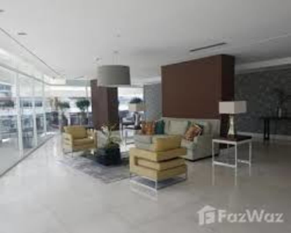 Modern commercial entryway with glass doors and signage PH Tee One Panama City