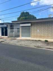 Storefront with metal roller shutter and security gate in Costa Verde Commercial Plaza La Chorrera Panama