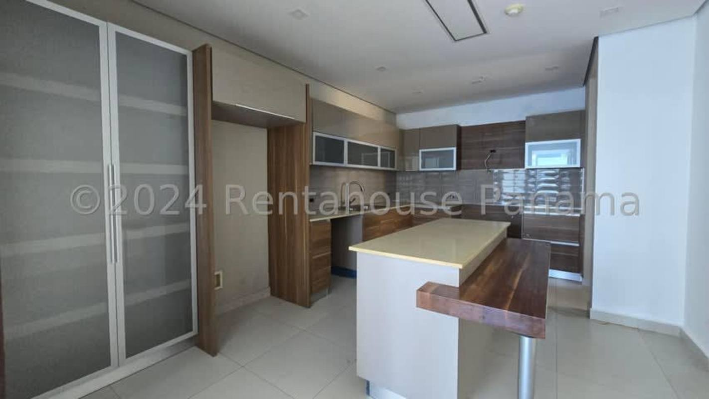 Contemporary kitchen with island and built-in cabinets PH Marina Plaza Marbella Panama