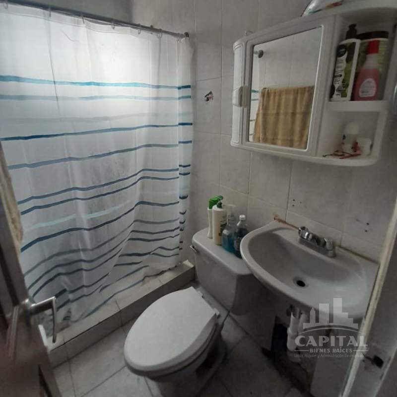 Small bathroom with bathtub shower curtain mirror cabinet PH Terrano Rio Abajo Panama