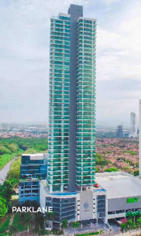 Spacious living room marble floors balcony access panoramic ocean and city view in PH Parklane Costa del Este Panama