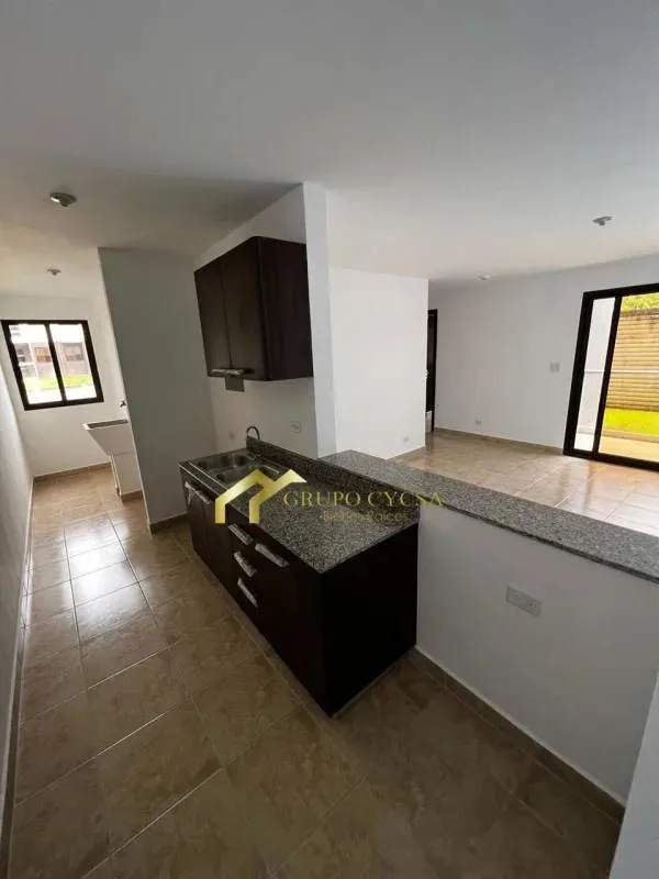Open kitchen with granite countertop in apartment for rent PH Altos del Este Tocumen Panama