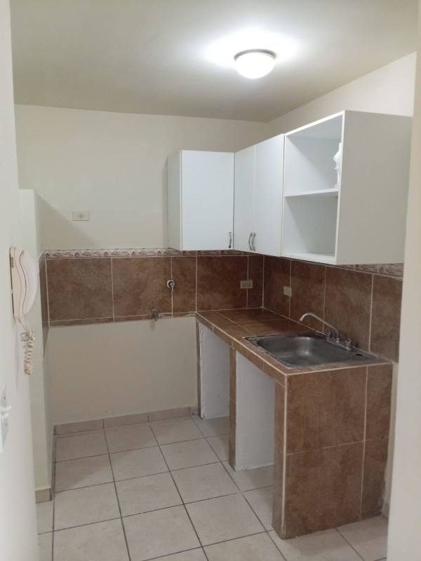 Vacant interior room with ceramic tile and small high window PH Las Lomas Panama apartment