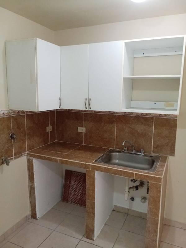 Empty simple interior small room tiled floor PH Las Lomas apartment Panama