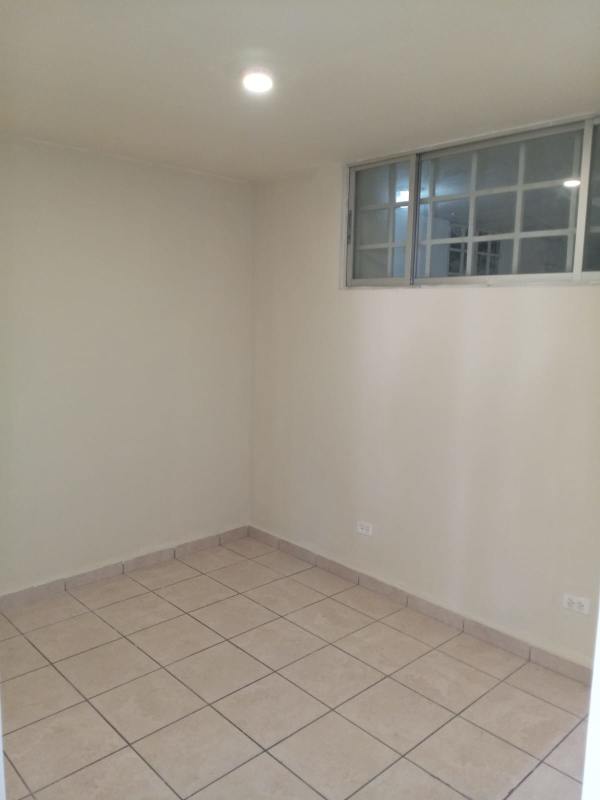 Basic kitchen with brown tile counters and backsplash PH Las Lomas 12 de Octubre affordable apartment for sale