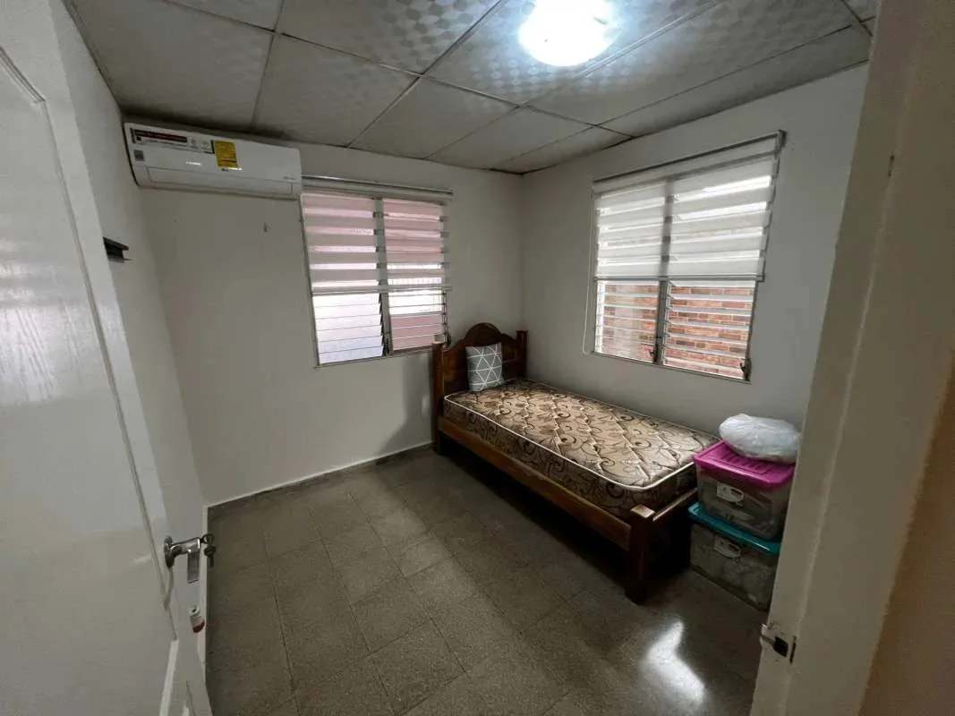 Furnished living and dining area with contemporary furniture and decorative ceiling Villa Lucre Panama City