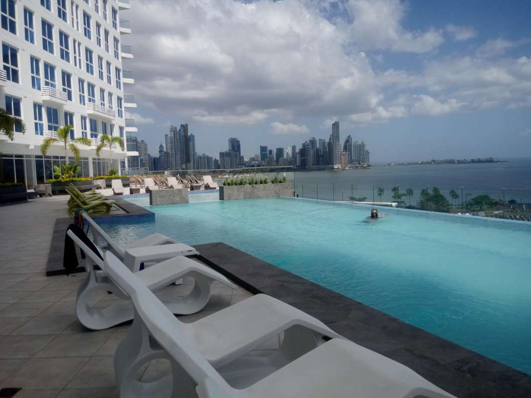 Modern eating area with marble floor and harbor view at PH BICSA Panama