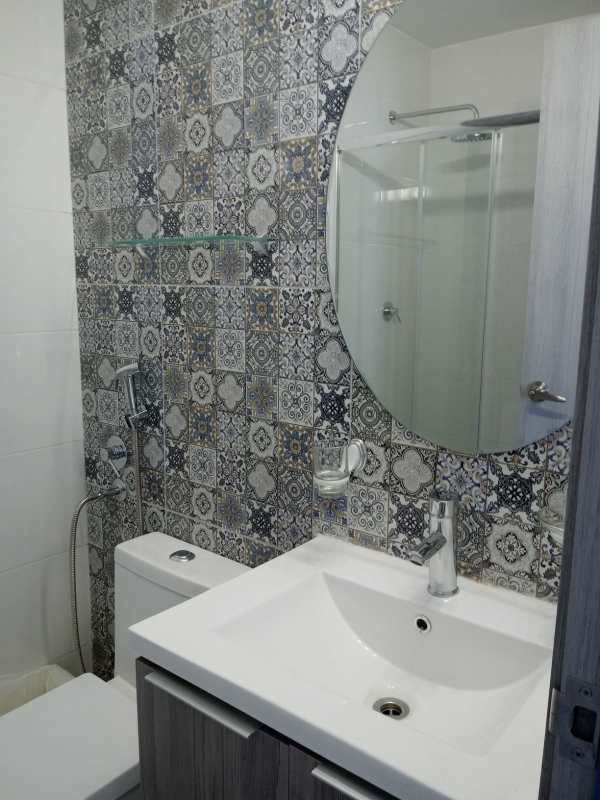 Bathroom modern patterned tiles round mirror glass shower PH BICSA Panama City