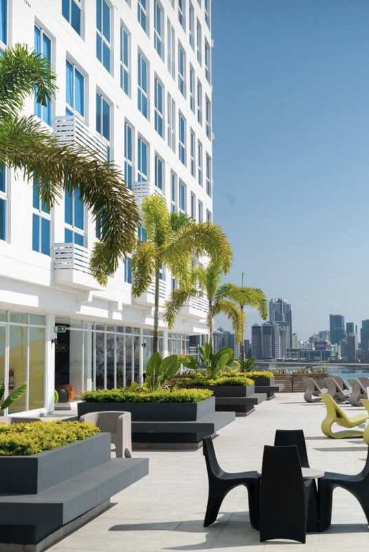 Large terrace with palm trees, city skyline and sea view PH BICSA Panama