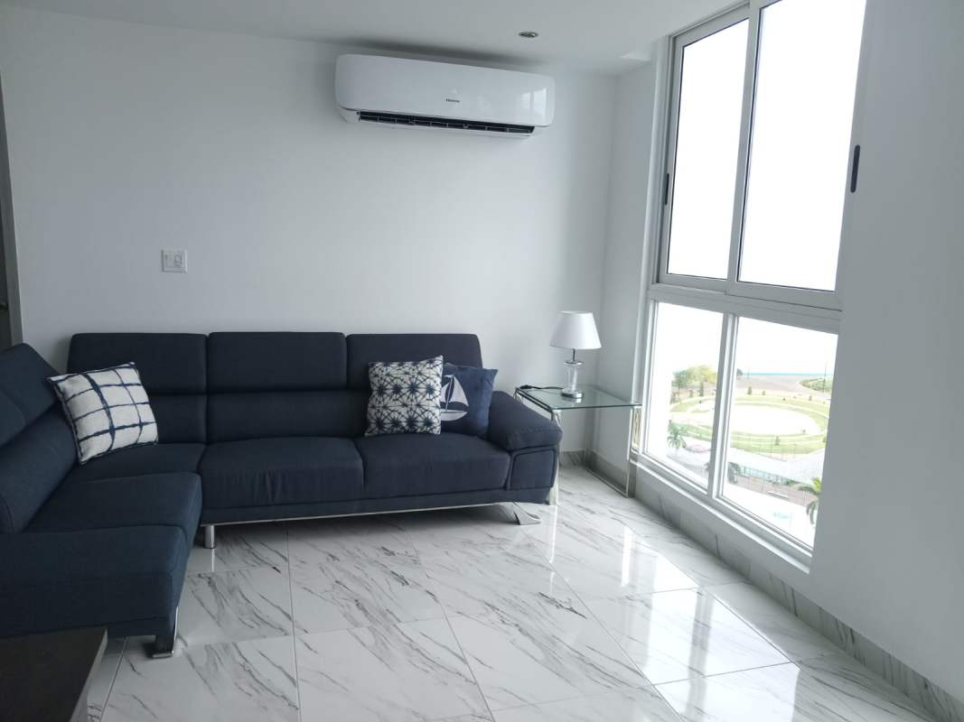 Living room navy sectional sofa, marble floor, view ocean PH BICSA Panama