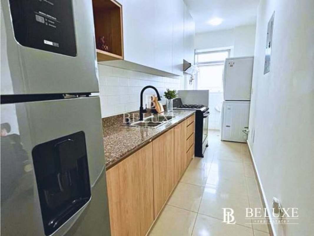 Contemporary kitchen with granite countertops in PH La Torraca San Francisco Panama