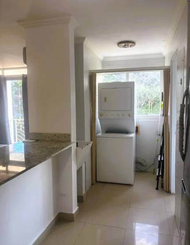 Laundry area with washer dryer granite counter and bright window PH Albrook Gardens Clayton Panama