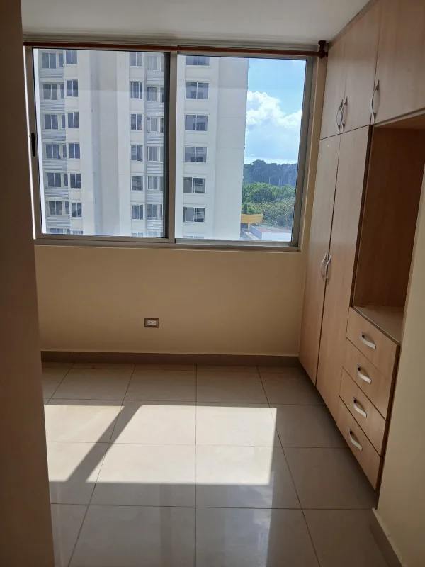 Interior apartment corridor with three doors and ceiling light PH Condado Country Club Condado del Rey Panama rental