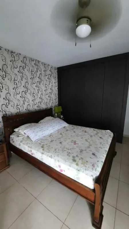 Open layout kitchen with granite countertop and extensive cabinets in PH Sol del Este Costa del Este