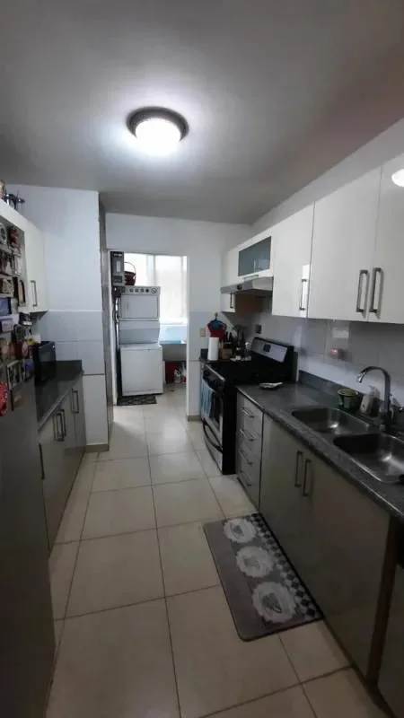 Secondary bedroom featuring tile flooring and closets PH Sol del Este Panama