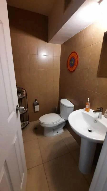 Bathroom with walk-in shower and modern sink PH Sol del Este in Costa del Este Panama City