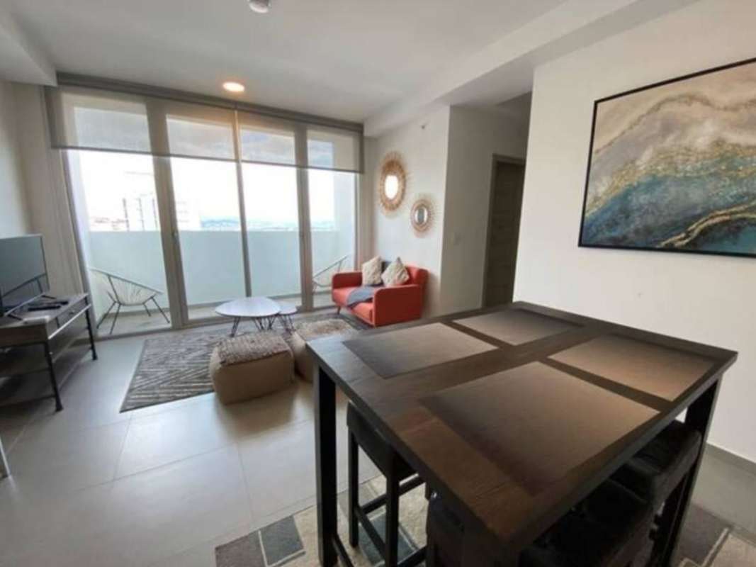 Bedroom with large window and city skyline views in PH Signature Point Panama City