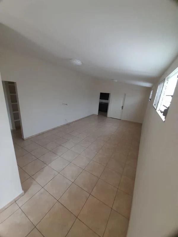 Modern kitchen with granite countertops, dark cabinets for rent house Brisas del Golf Panama