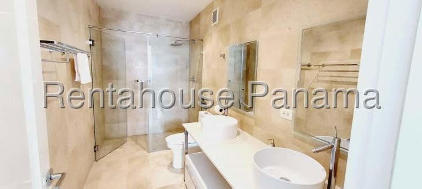 Modern bathroom with glass shower enclosure at PH BICSA Financial Center Panama City
