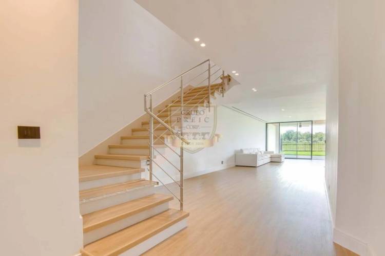 Gourmet kitchen with island, quartz countertops, high-end appliances in Santa María Panama luxury estate