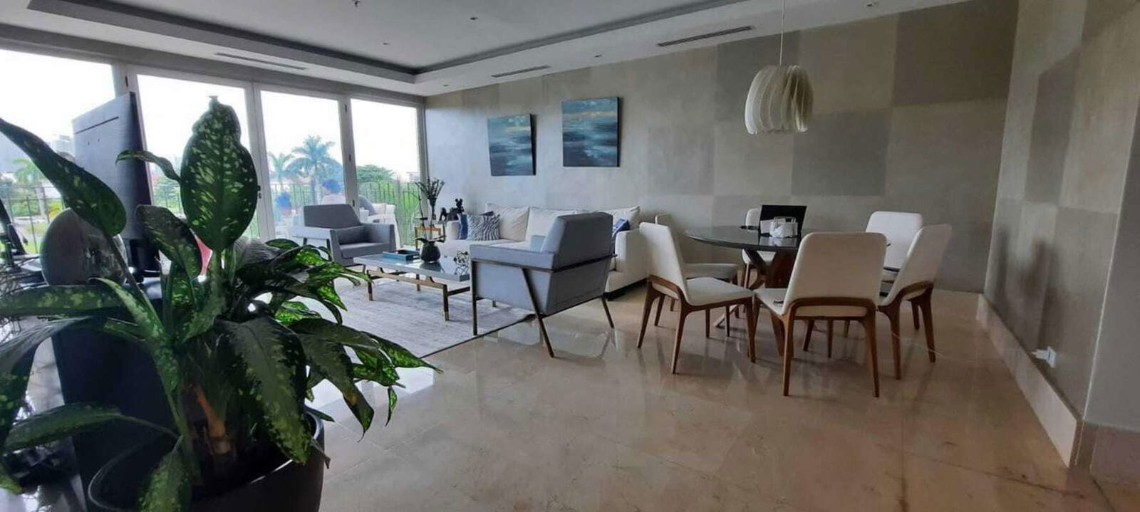 Spacious luxury apartment living dining area with panoramic golf course views Santa Maria Panama City