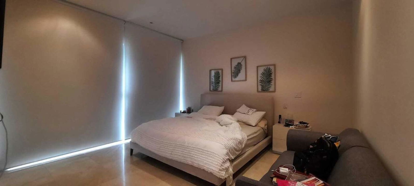 Dining area with large glass doors opening to terrace and golf views in Santa Maria Panama condo