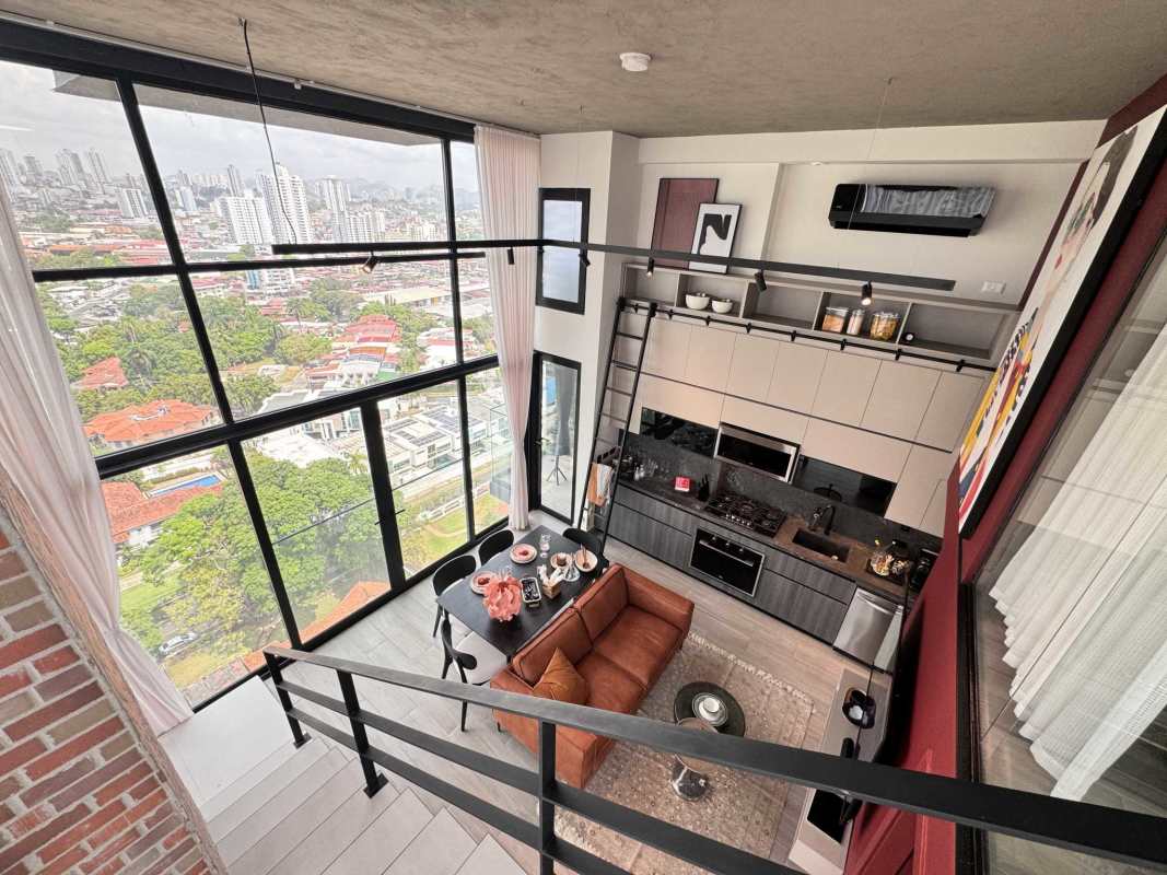 Bathroom with marble-effect tiles, floating vanity and glass enclosed shower at PH Dovle Panama
