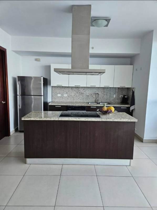 Modern apartment living room with floor-to-ceiling windows and ocean balcony in Punta Pacifica Panama