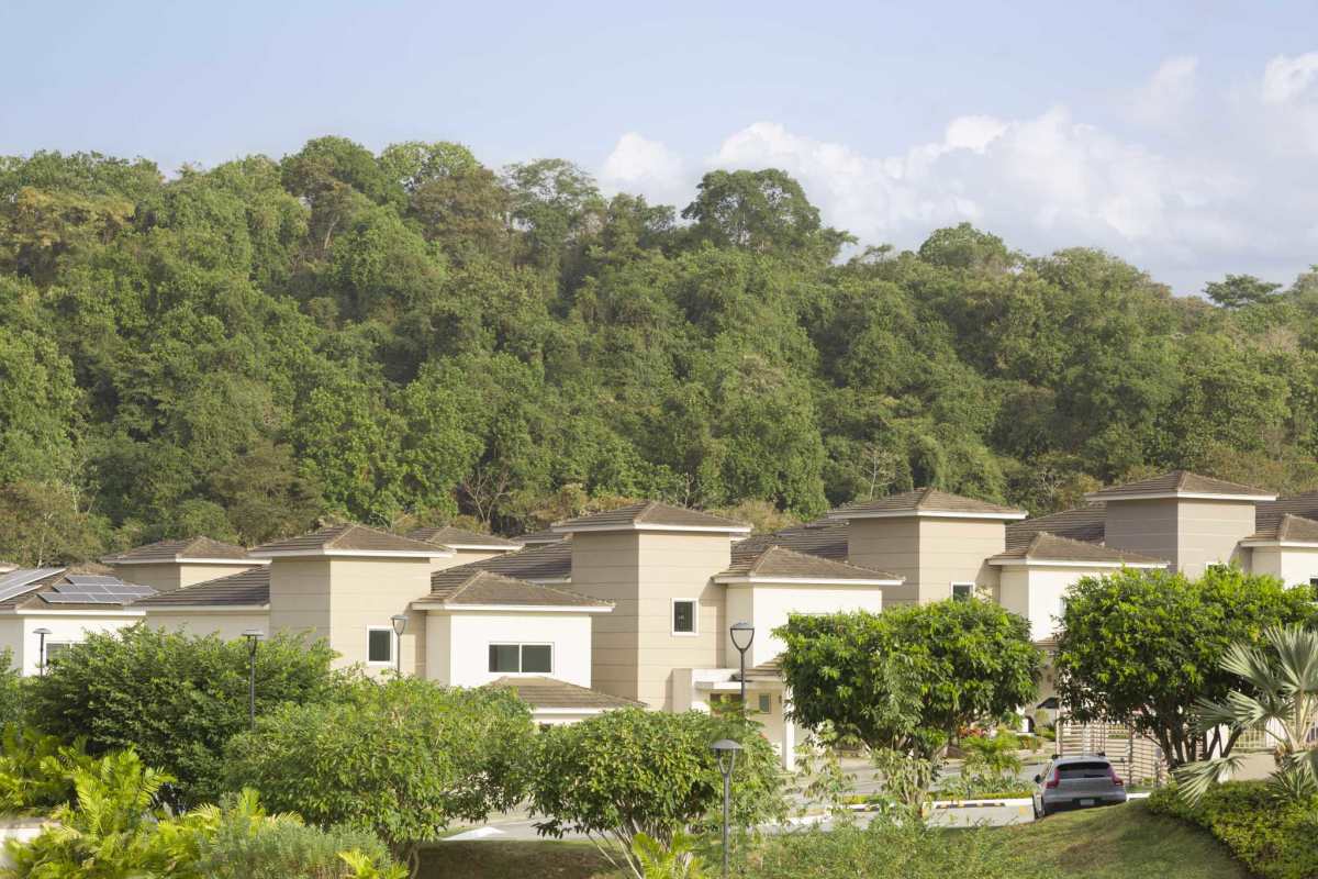 Modern beige residential houses in lush suburban Altos del Parque Panama