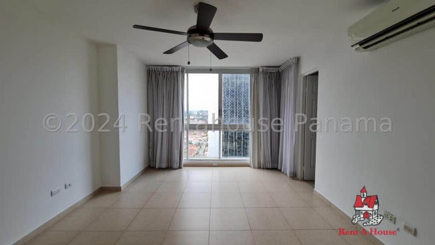 Separate kitchen with granite countertops and cabinetry in Costa del Este Panama