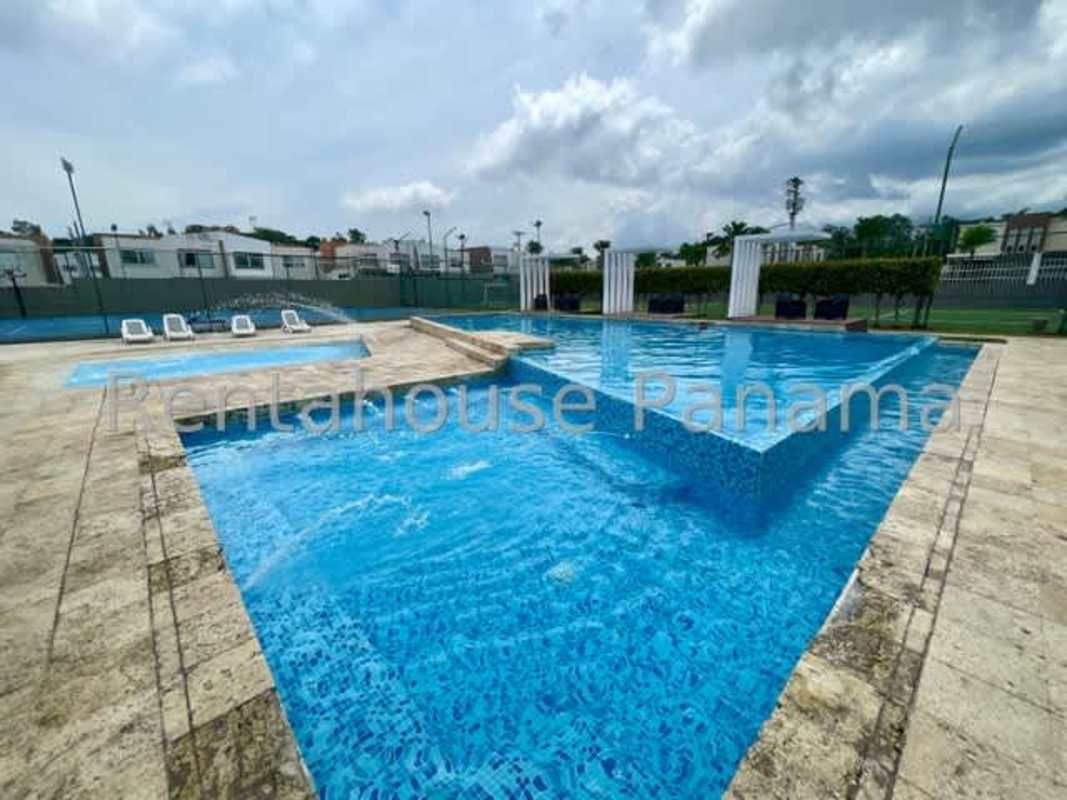 Outdoor swimming pool amenity in PH Everest Paseo del Norte Panama City with lounge area