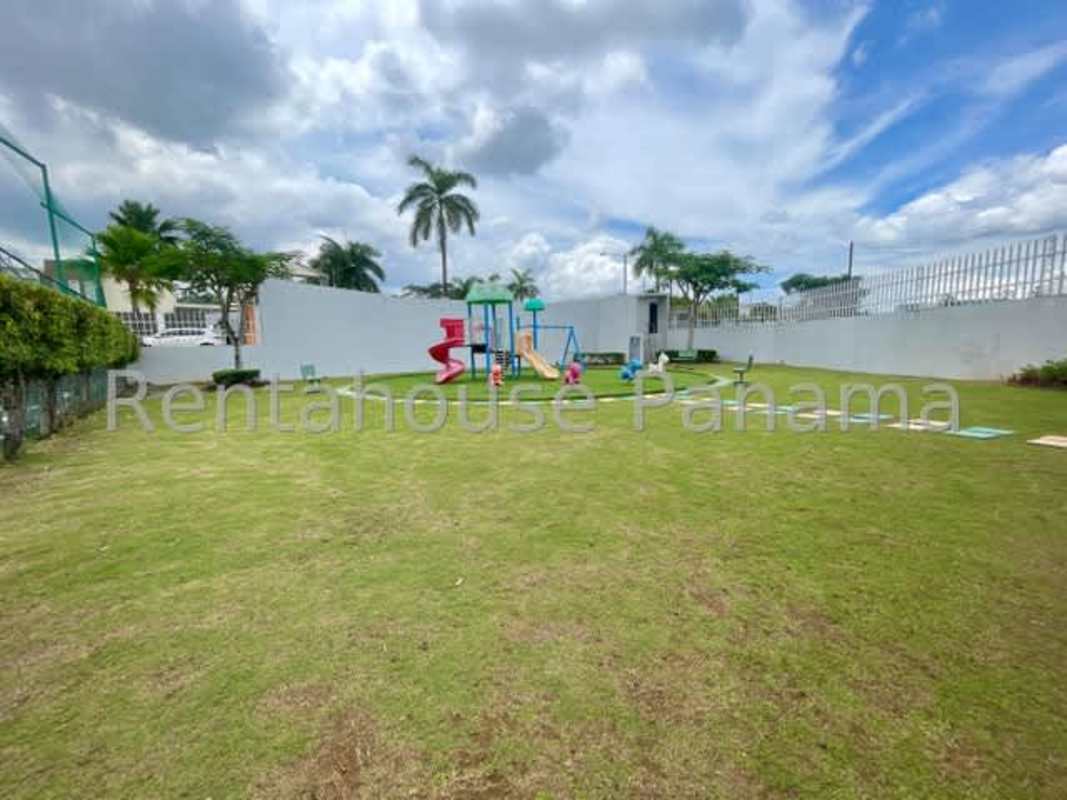 Outdoor kids play area with playground set fenced in PH Everest Paseo del Norte Panama City
