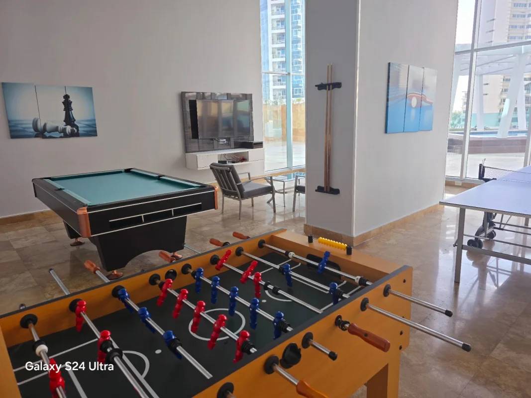 Double-height luxury lobby with reception at PH Titanium Costa del Este Panama