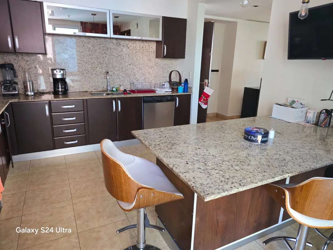 Fully equipped contemporary kitchen with granite countertops in PH Titanium Costa del Este Panama