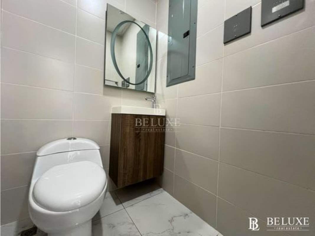 Open-plan collaborative workspace area in RBS Tower with modern desks and chairs