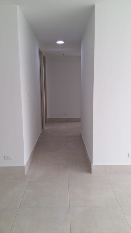 Sunny rooftop swimming pool deck overlooking the city at PH Sky Point Tower