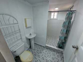 Empty bedroom with tiled floor, window and light in Burunga property Panama