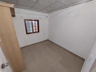Bedroom empty with tile floor window view Burunga home sale Panama Oeste