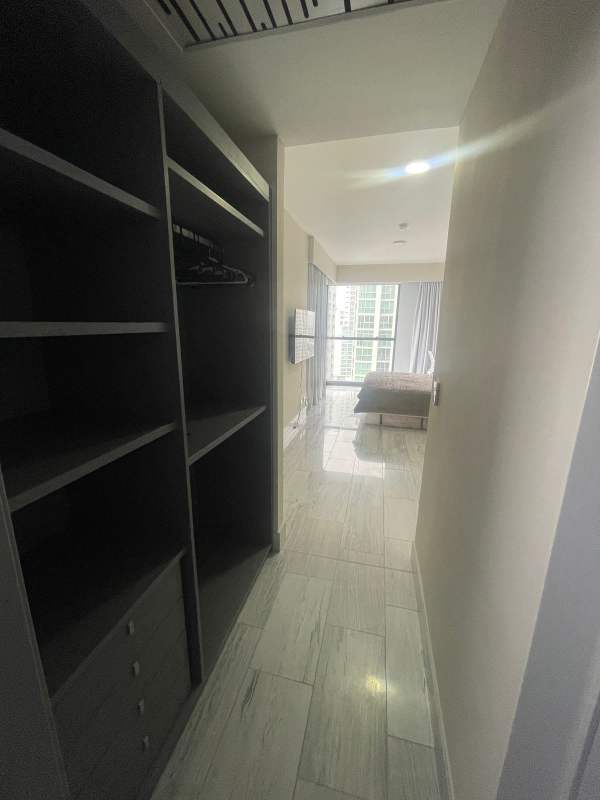 Elegant modern lobby with marble finishes, designer furniture, stylish lighting at PH Armani Panama