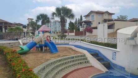 Playground with slides landscaped garden residential beach community Panama