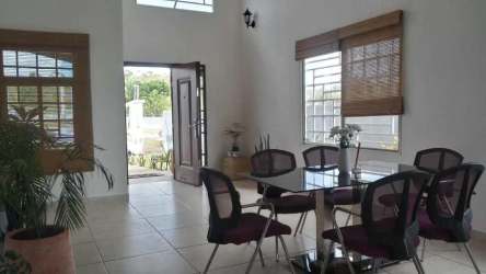 Spacious living and dining area with ceramic floors in Vista Verde house Panama