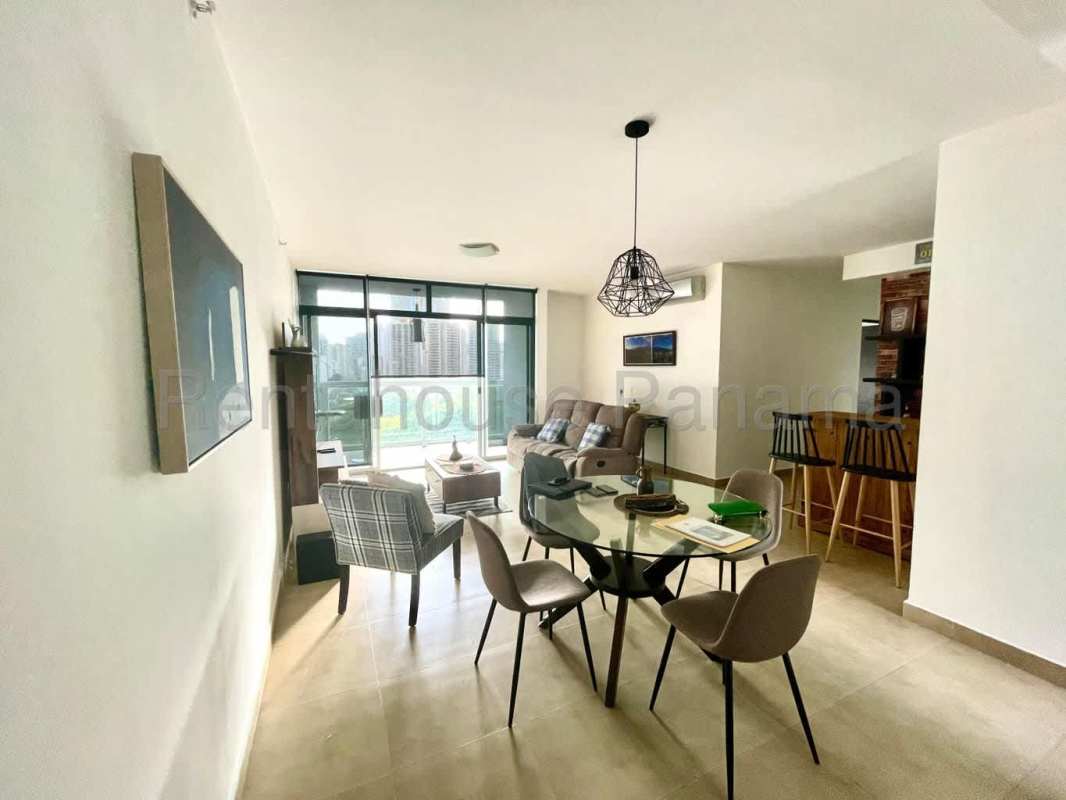 Spacious walk-in closet with custom wood shelving and storage in PH San Francisco Bay Panama